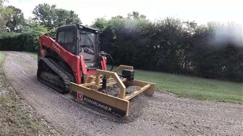 makung driveway with skid steer|skid steer driveway repair.